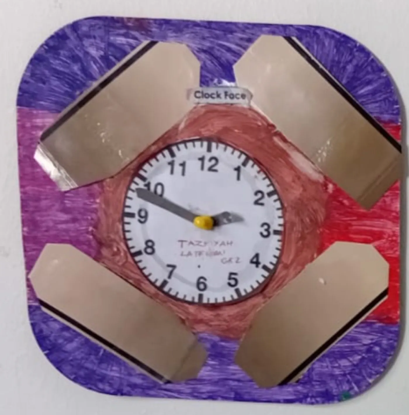 Grade 2 clock face craft with foil detailing